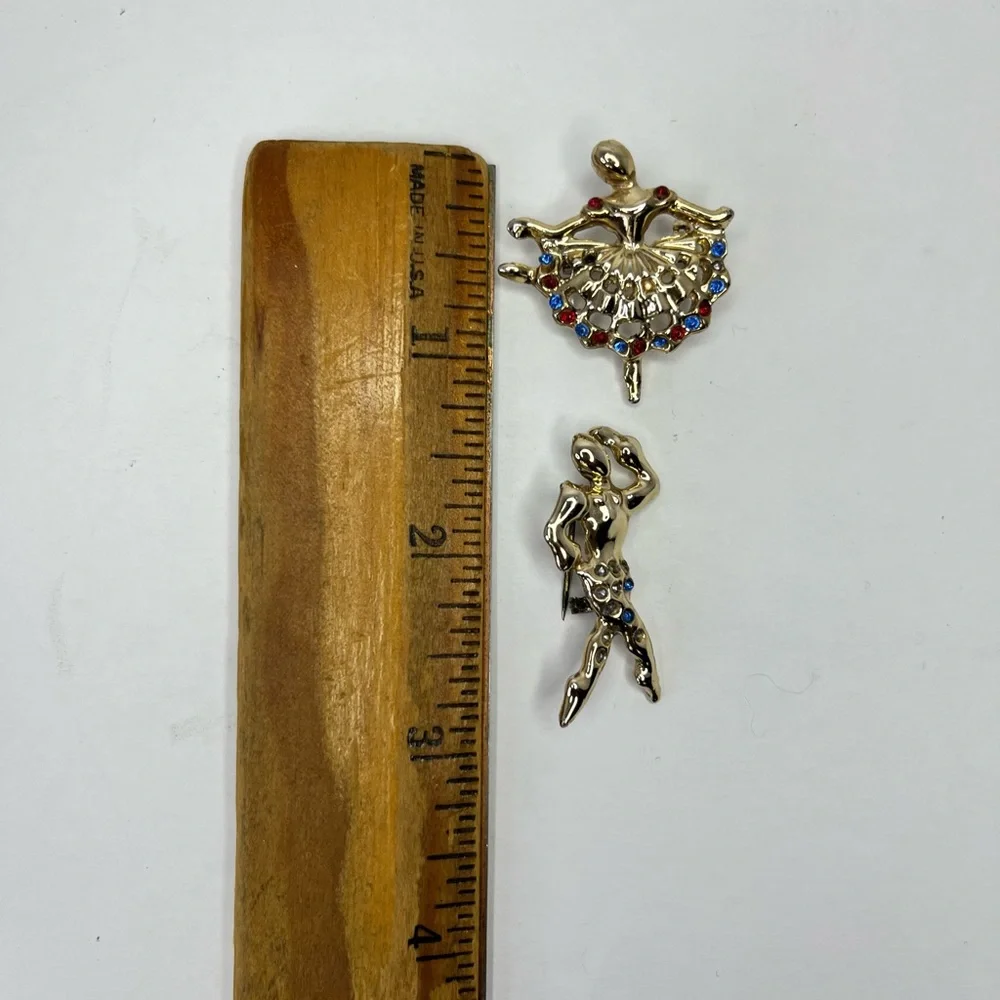 GOLD TONE AND RHINESTONE DANCING BROOCHES - MULTICOLOR DANCERS.‎